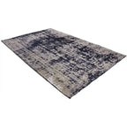 Diagonaal aanzicht van het vloerkleed RAYDEN in de kleur Blauw, gemaakt van Wol mix.