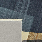 Achterkant hoek aanzicht van het vloerkleed RINDELL in de kleuren Multikleurig / Blauw, gemaakt van Polyester.