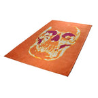 Diagonaal aanzicht van het vloerkleed SAVIK in de kleur Oranje, gemaakt van Katoen.