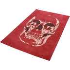 Diagonaal aanzicht van het vloerkleed SAVIK in de kleur Rood, gemaakt van Katoen.