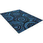 Diagonaal aanzicht van het vloerkleed SORELLE in de kleuren Zwart / Blauw, gemaakt van 100% Wol.