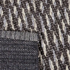 Achterkant hoek aanzicht van het vloerkleed SOREN in de kleuren Grijs / Mix, gemaakt van Wol mix.