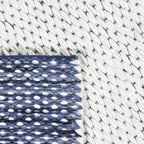 Omgekeerd achterkant hoek aanzicht van het vloerkleed TALLUNE reversible in de kleuren Blauw / Wit, gemaakt van Wol mix.