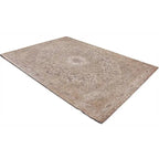 Diagonaal aanzicht van het vloerkleed TALMAR in de kleur Beige, gemaakt van Katoen.
