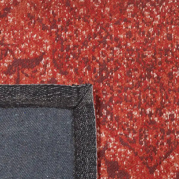 Achterkant hoek aanzicht van het vloerkleed TALMAR in de kleur Donker Rood, gemaakt van Katoen.