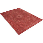 Diagonaal aanzicht van het vloerkleed TALMAR in de kleur Donker Rood, gemaakt van Katoen.