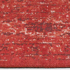 Zijkant detail aanzicht van het vloerkleed TALMAR in de kleur Donker Rood, gemaakt van Katoen.