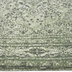 Zijkant detail aanzicht van het vloerkleed TALMAR in de kleur Groen, gemaakt van Katoen.
