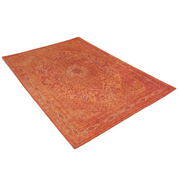 Diagonaal aanzicht van het vloerkleed TALMAR in de kleur Oranje, gemaakt van Katoen.
