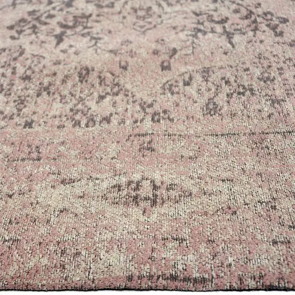 Zijkant detail aanzicht van het vloerkleed TALMAR in de kleur Roze, gemaakt van Katoen.