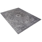 Diagonaal aanzicht van het vloerkleed TALMAR in de kleur Zwart, gemaakt van Katoen.