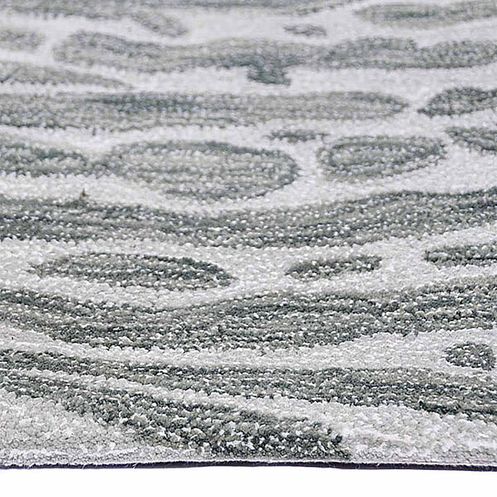 Zijkant detail aanzicht van het vloerkleed TALRON UP in de kleur Groen, gemaakt van Wol en Viscose mix.