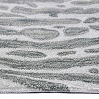 Zijkant detail aanzicht van het vloerkleed TALRON UP in de kleur Groen, gemaakt van Wol en Viscose mix.