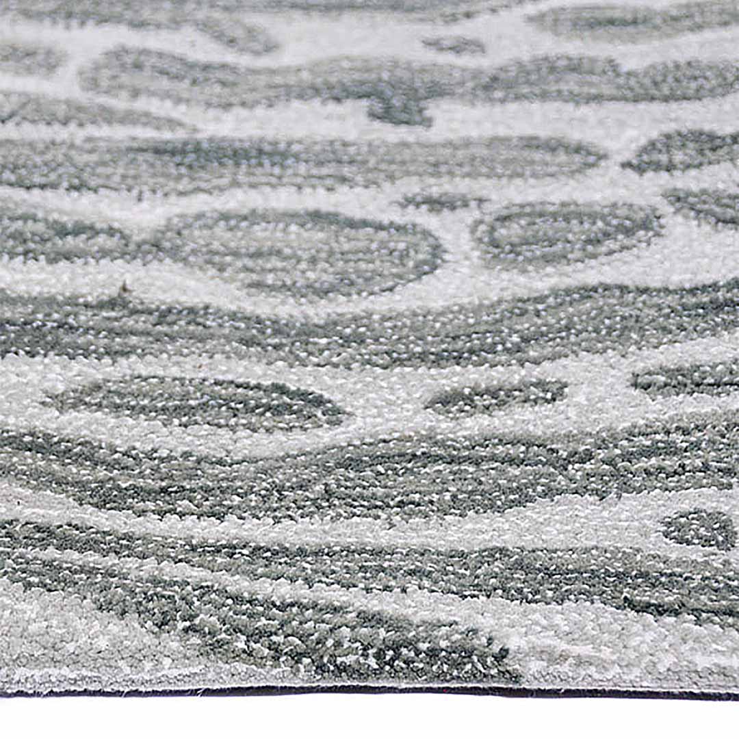 Zijkant detail aanzicht van het vloerkleed TALRON UP in de kleur Groen, gemaakt van Wol en Viscose mix.