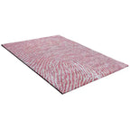 Diagonaal aanzicht van het vloerkleed TALRON UP in de kleuren Roest / Roze, gemaakt van Wol en Viscose mix.