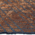 Zijkant detail aanzicht van het vloerkleed TALVOR in de kleuren Roest / Oranje, gemaakt van Wol mix.