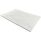 Diagonaal aanzicht van het vloerkleed TYRON in de kleur Wit, gemaakt van Polyester.