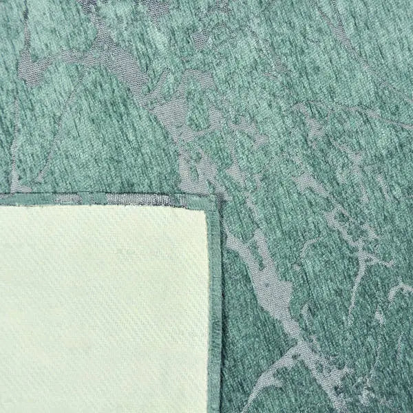 Achterkant hoek aanzicht van het vloerkleed VORIEN in de kleuren Aqua / Blauw, gemaakt van Polyester.