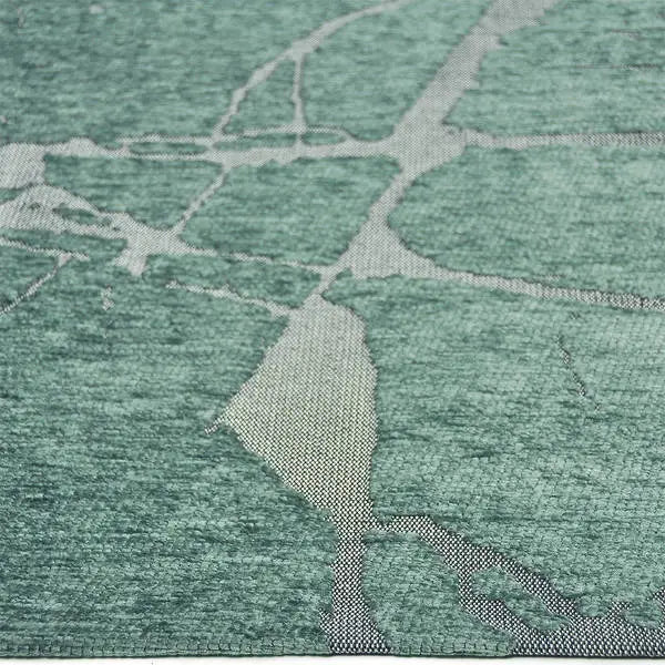 Zijkant detail aanzicht van het vloerkleed VORIEN in de kleuren Aqua / Blauw, gemaakt van Polyester.