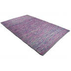 Diagonaal aanzicht van het vloerkleed ZAVEN in de kleuren Multikleurig / Blauw / Roze, gemaakt van Wol mix.